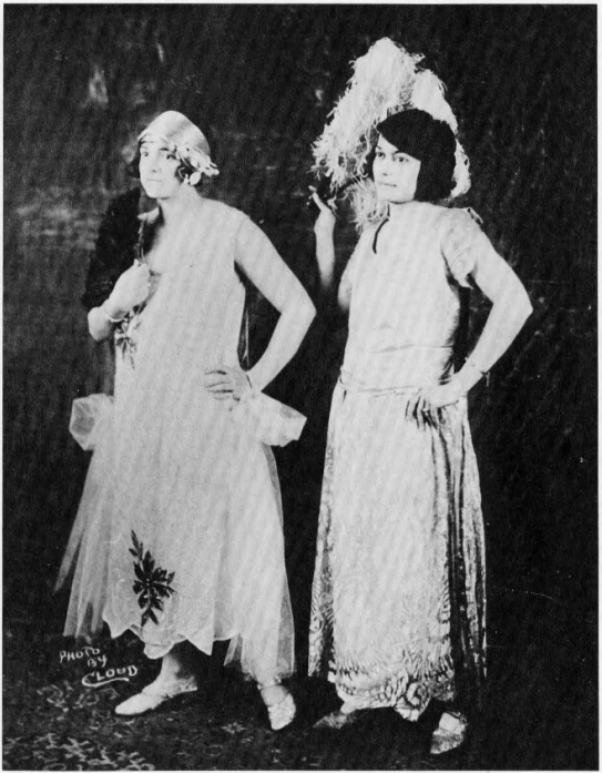 image of two females posing