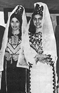 Mrs. Yasir Allis and Miss Ruth Nader in Palestinian dress, at the nationalities reception in City Hall for Cardinal Mindzenty in 1974.