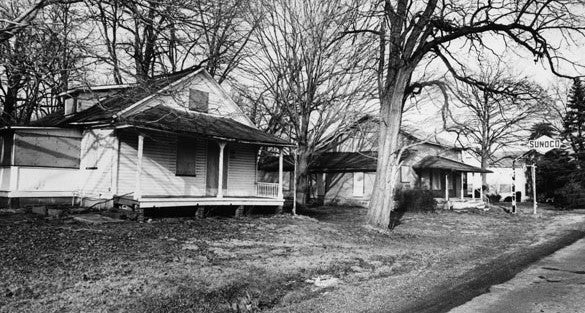 RESIDENTS NOT WELCOME. Houses in the village of Everett lie boarded up as the National Park Service acquires properties it deems are illegal in the new national park.