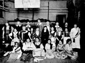 Play presented by students of Americanization classes Helen Horvath is seated in the center of the middle row.