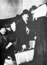 Italian Immigrants climbing the iron steps leading to the reception hall, Ellis Island, 1905.