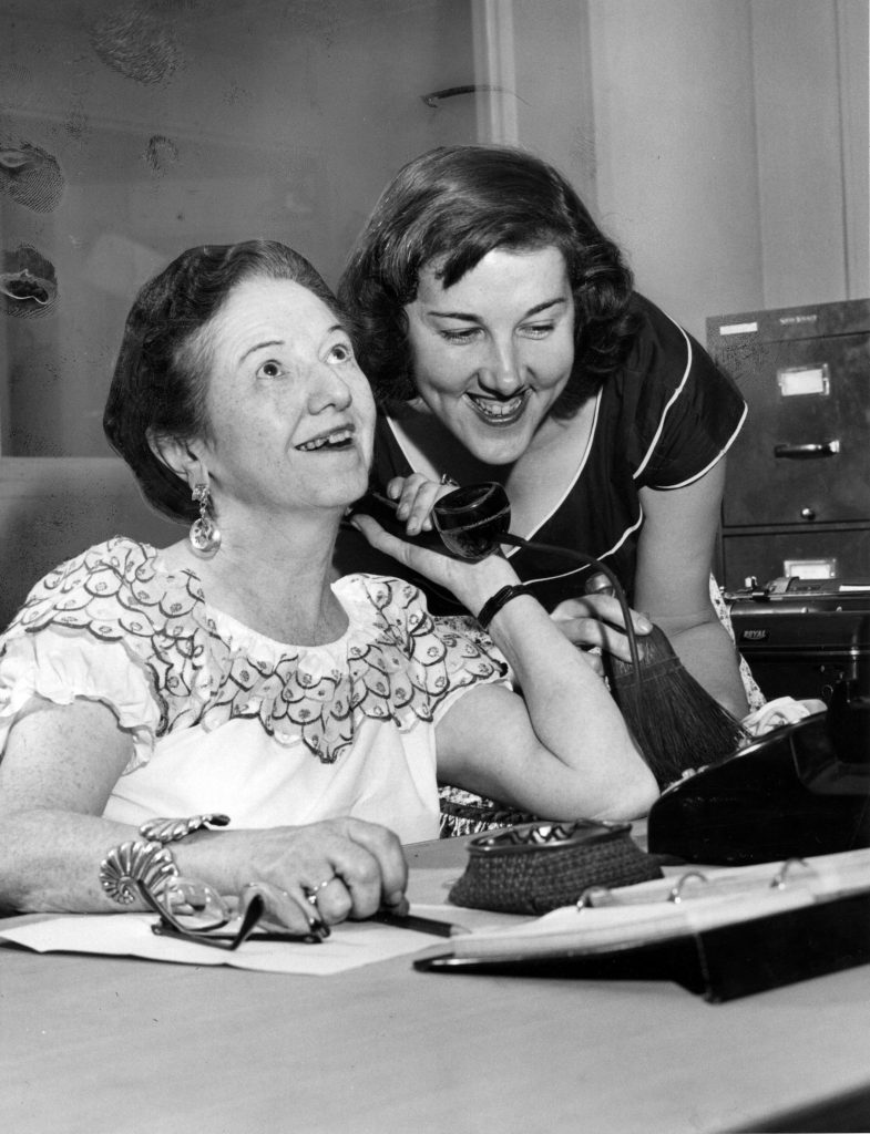 The Plain Dealer's legendary rock 'n' roll critic Jane Scott, right, began her career as assistant society reporter. Scott is pictured here in 1956 with her boss, Louise Davis. Cleveland Public Library Photograph Collection.