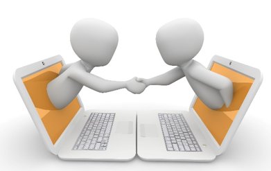 Humanoid Silhouettes emerging from laptop screens and shaking hands