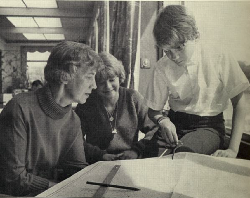 Virginia, Robin and Douglas study chart to pinpoint Tinkerbelle's position. (Daily Mirror photographer--London)