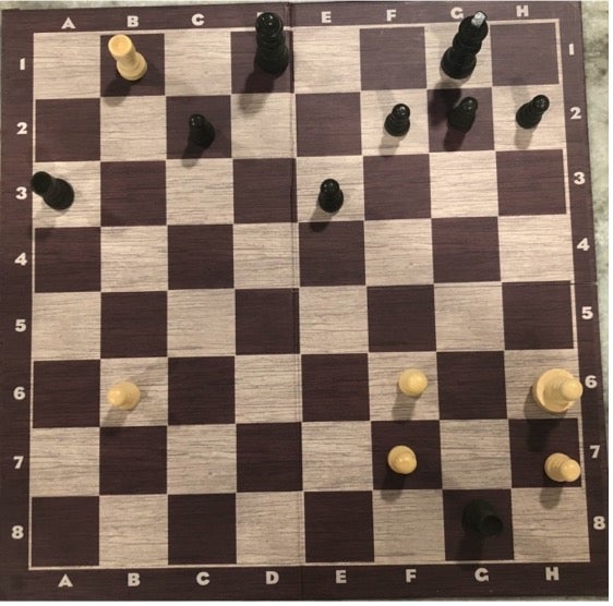 My local library set-up a new chess problem everyday, here is today's !  White to play and win in 4 moves : r/chess