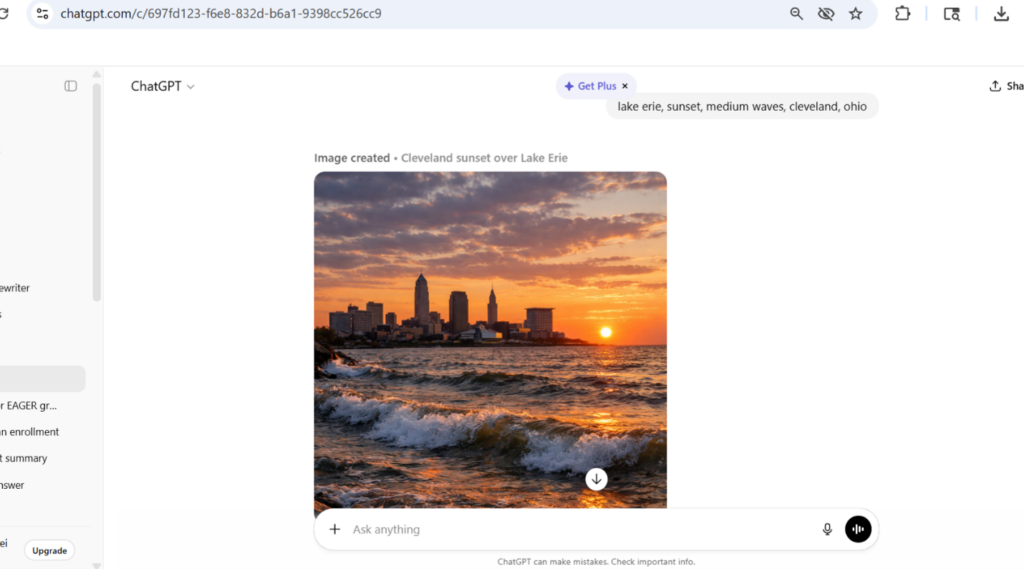 Skyline of Cleveland, Ohio during sunset in the background and Lake Erie waves in the forefront.